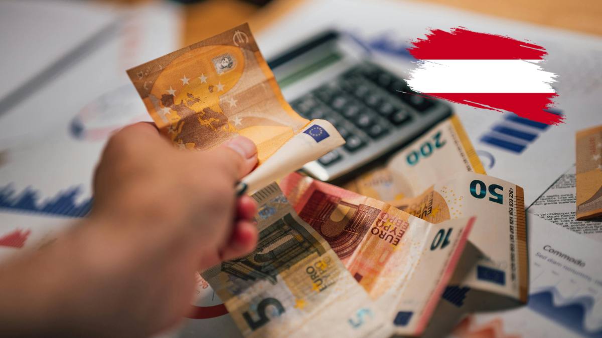 Salariul minim în Austria în 2026 și 2027 – bancnote euro și calculator